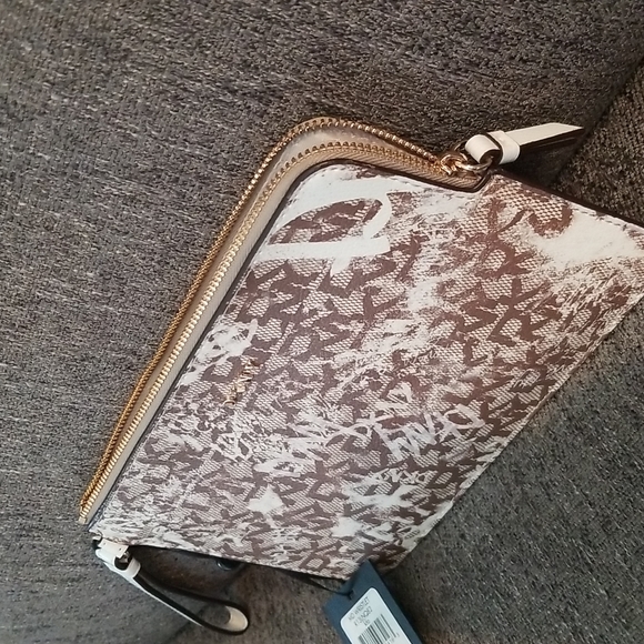 Nwt DKNY medium brown graffiti wristlet. Retails $78 - Picture 6 of 8